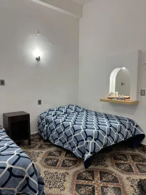 Cama o camas de una habitación en Habitaciones Climar