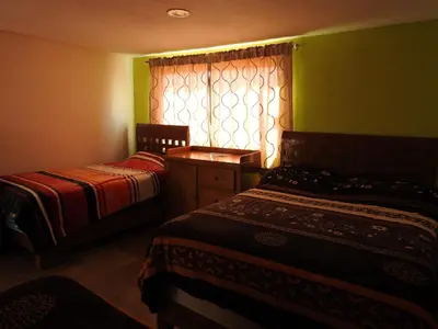 Cama o camas de una habitación en MJ Habitaciones Cholula