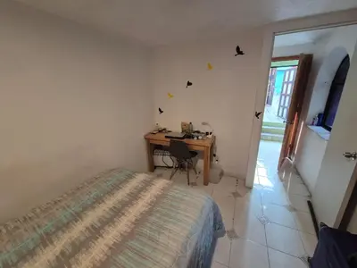 Cama o camas de una habitación en YUCATAN44 Alojamiento para el mundial