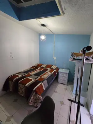 Cama o camas de una habitación en YUCATAN44 Alojamiento para el mundial