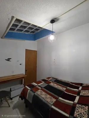 Cama o camas de una habitación en YUCATAN44 Alojamiento para el mundial