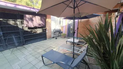 Un patio o zona al aire libre en YUCATAN44 Alojamiento para el mundial