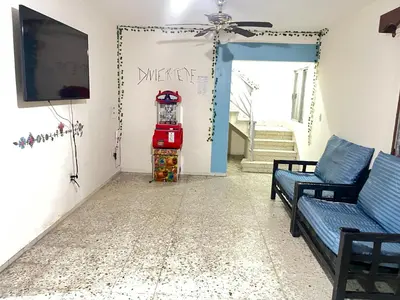 Una televisión o centro de entretenimiento en Casona el Sol