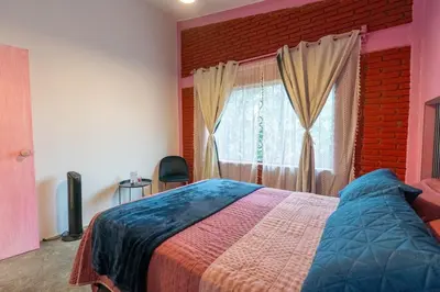 Cama o camas de una habitación en Apartment in Convention Center, Oaxaca