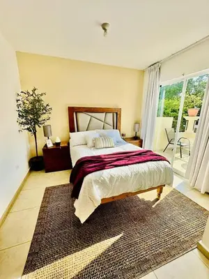 Cama o camas de una habitación en Casa completa en fraccionamiento privado San Jerónimo Coatepec