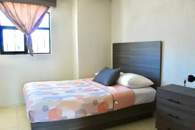 Cama o camas de una habitación en departamento plus 1917