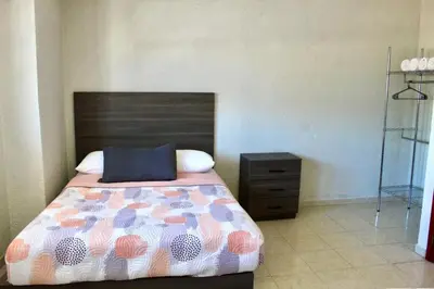Cama o camas de una habitación en departamento plus 1917