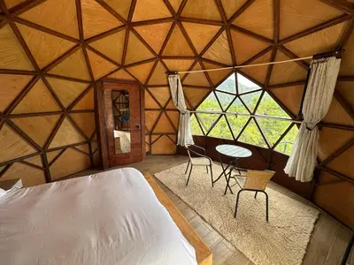 Cama o camas de una habitación en Gaiatri Holistic Glamping