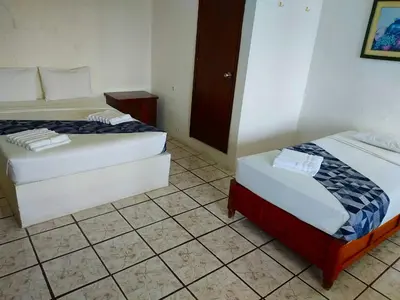 Cama o camas de una habitación en Ameyali Teques