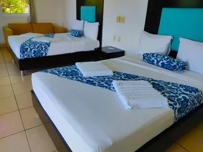 Cama o camas de una habitación en Ameyali Teques
