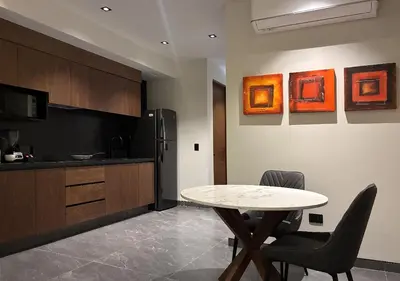 Una cocina o zona de cocina en Hotel Suites Regente Cholula