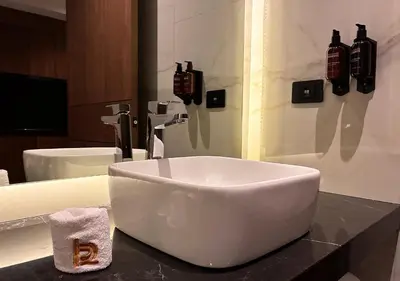 Un baño de Hotel Suites Regente Cholula