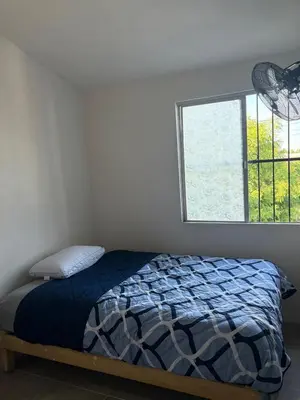 Cama o camas de una habitación en Comoda casa para alojamiento