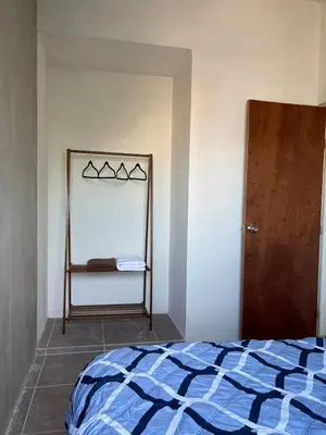 Cama o camas de una habitación en Comoda casa para alojamiento