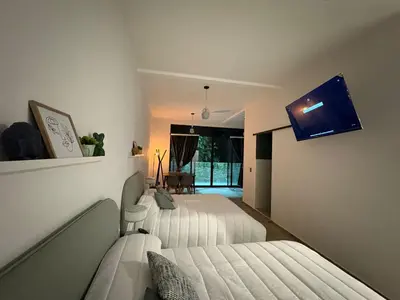 Cama o camas de una habitación en Loft ËNXË Boutique Habitación Olivo