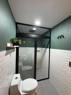 Un baño de Loft ËNXË Boutique Habitación Olivo
