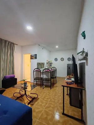 Una televisión o centro de entretenimiento en Abuelita