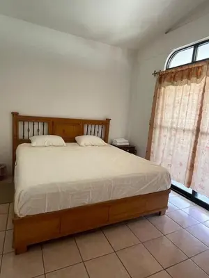 Cama o camas de una habitación en Casa Xicarú complete