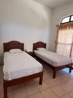 Cama o camas de una habitación en Casa Xicarú complete