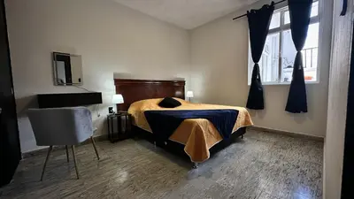 Cama o camas de una habitación en DCalli Next to the Alameda, terrace and confort