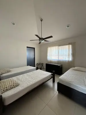 Cama o camas de una habitación en Casa Mango