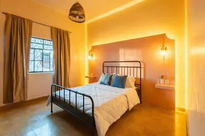 Cama o camas de una habitación en Casa céntrica con 4 habitaciones y estacionamiento