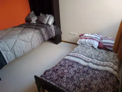 Cama o camas de una habitación en Casa puebla univ Politecnico