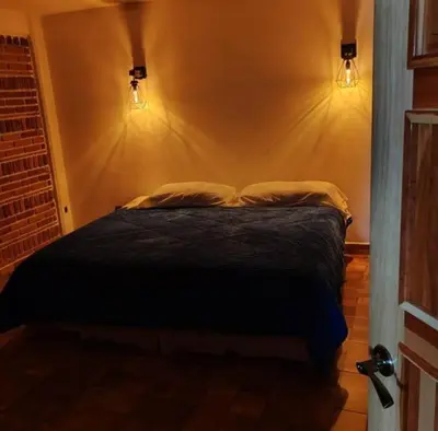 Cama o camas de una habitación en Cabañas Aruba