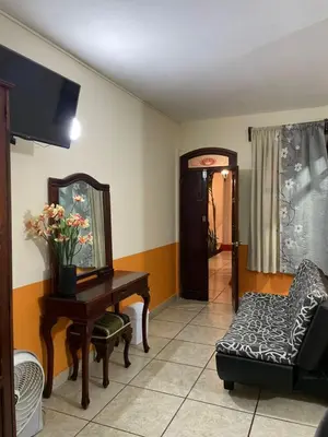 Zona de estar de Hotel Real de Cortés