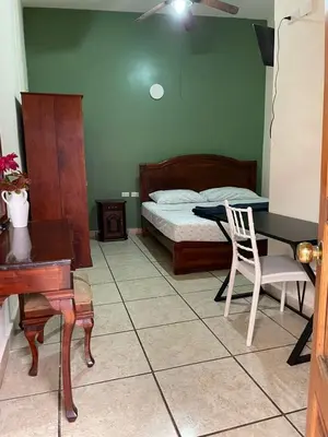 Cama o camas de una habitación en Hotel Real de Cortés