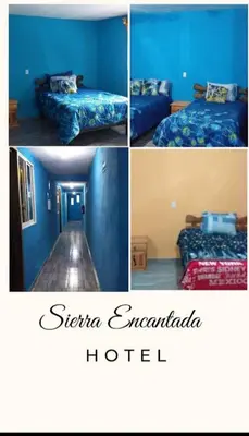 Cama o camas de una habitación en Hotel Sierra Encantada