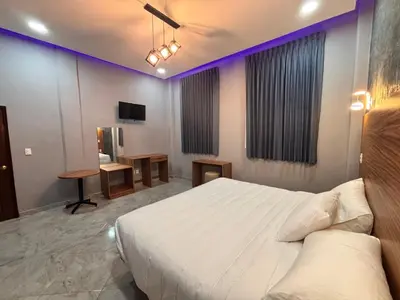 Cama o camas de una habitación en Grand Hotel Iguala