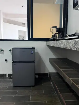 Una cocina o zona de cocina en Suite La Lomita #2 climatizada