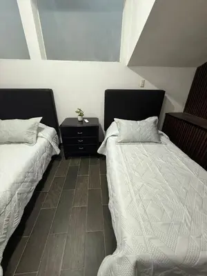 Cama o camas de una habitación en Suite La Lomita #2 climatizada