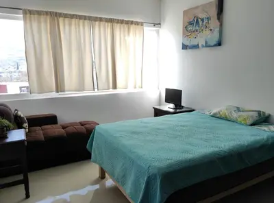 Cama o camas de una habitación en The most exclusive and safest area of the city