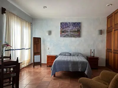 Cama o camas de una habitación en Diseño oaxaqueño contemporáneo en Etla