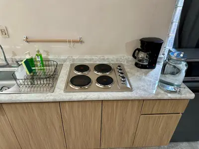 Una cocina o zona de cocina en Apartment with patio 15 minutes from downtown and Cholula