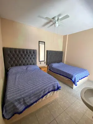 Cama o camas de una habitación en Casa de los Abuelos