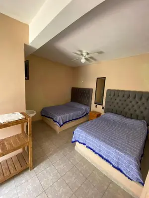 Cama o camas de una habitación en Casa de los Abuelos