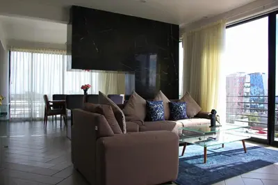 Zona de estar de Penthouse with Glass Floor and Volcano View