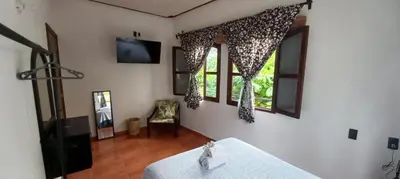 Una televisión o centro de entretenimiento en Casa Helechos