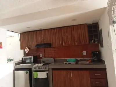 Una cocina o zona de cocina en Loft Guelaguetza B