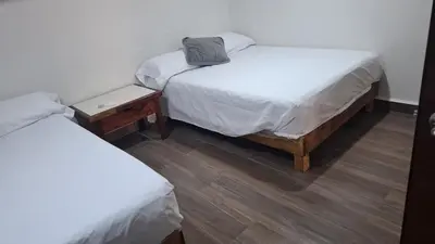 Cama o camas de una habitación en Loft Guelaguetza B