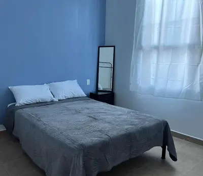 Cama o camas de una habitación en Depa centrico a 4 min de Santo Domingo caminando