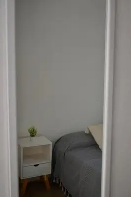 Cama o camas de una habitación en Casita en el centro de Oaxaca cerca de Santo Domingo