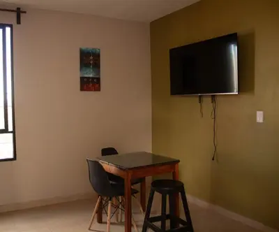 Una televisión o centro de entretenimiento en Depa III con vista al centro, a min de Santo Domingo