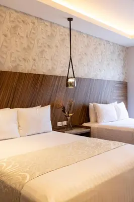 Cama o camas de una habitación en Hotel Boutique Alma