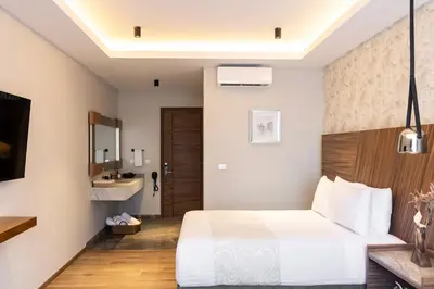 Cama o camas de una habitación en Hotel Boutique Alma