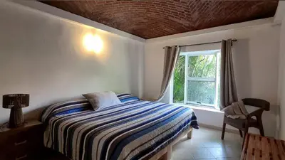 Cama o camas de una habitación en Casa Jardín del Alma