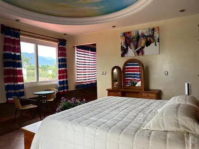 Cama o camas de una habitación en Habitación para tres a 25 minutos del centro de Oaxaca